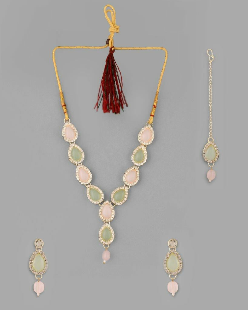 VOJ Gold-Polished Nude Pink And Mint Green Stone Studded Jewellery Set With Maang Tikka