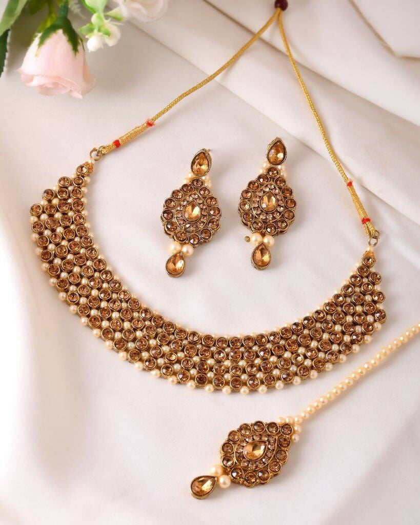 VOJ Gold-Polished Stone Studded Choker Necklace With Earrings And Manag Tikka Set