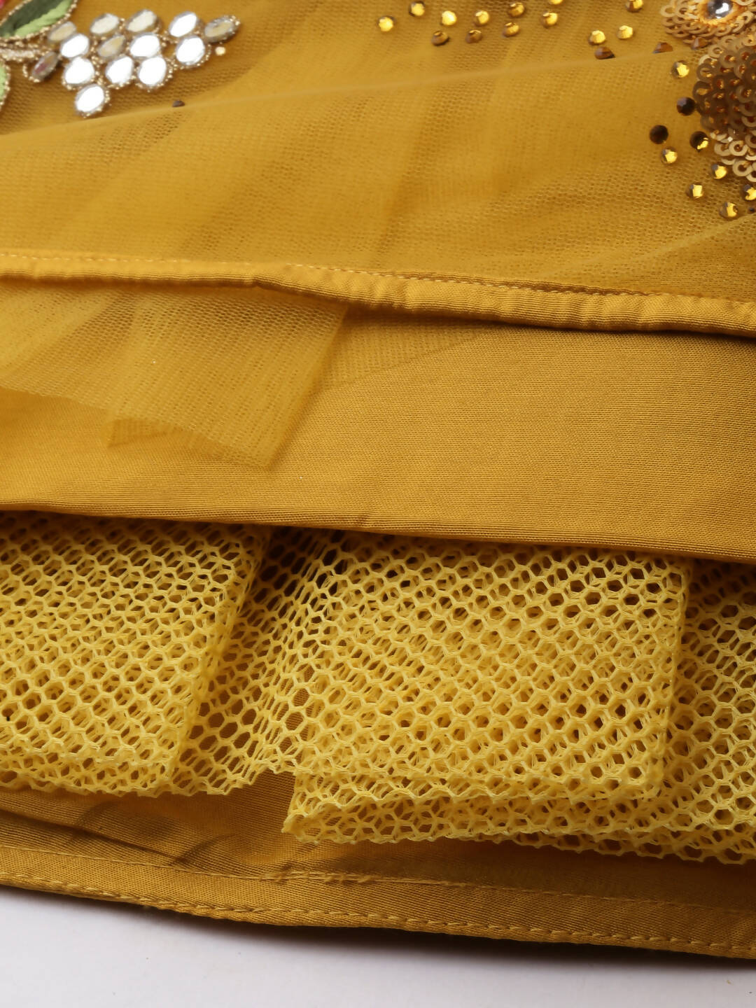 House of Panchhi Mustard Net Semi stitched Coding, Sequins & Saroski Stone Work Lehenga Choli