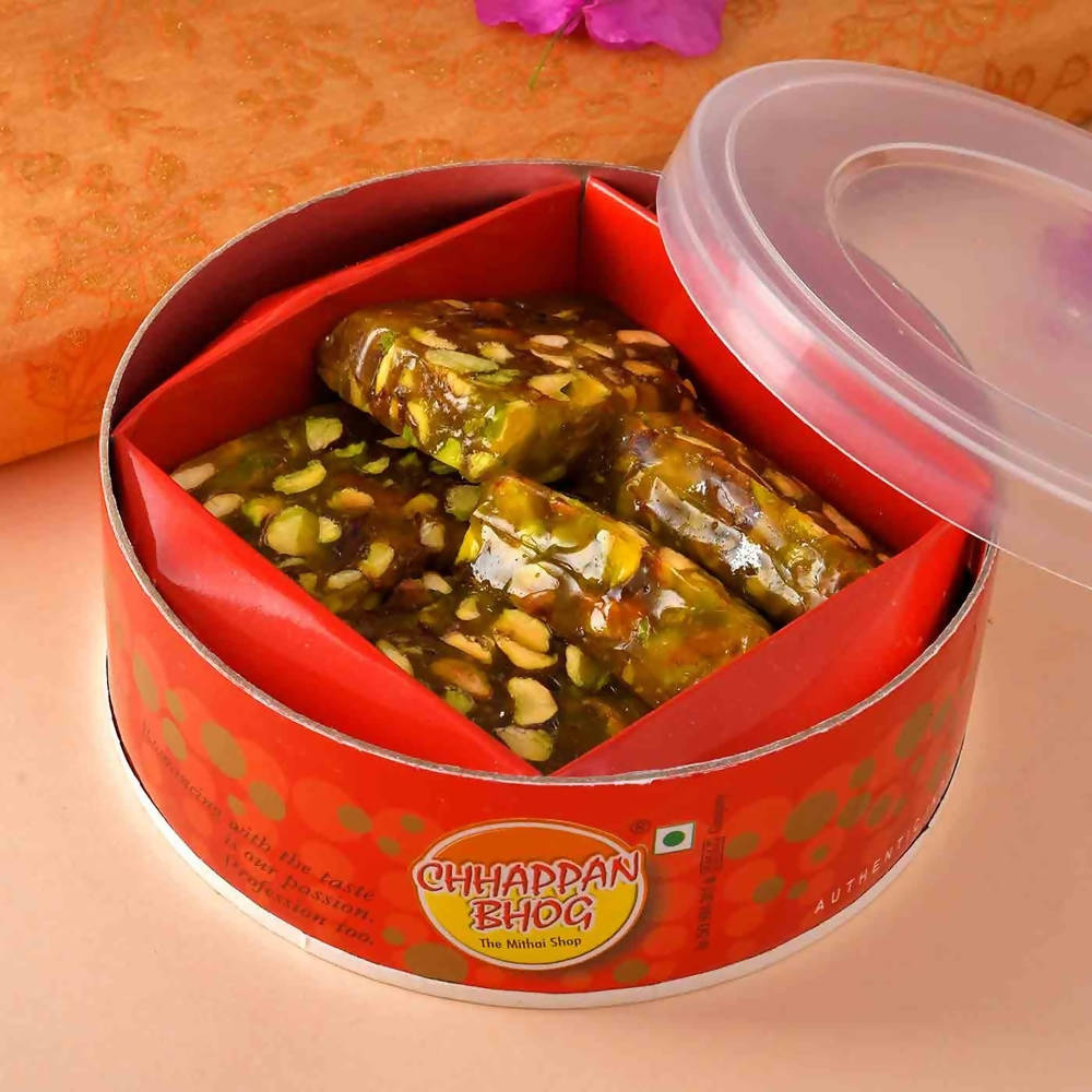 Peacock Rakhi & Kesar Pista Karachi Halwa 
