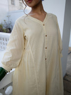 Janasya A-Line Dobby Cotton Cream Self Design V-Neck Tunic & Bottom