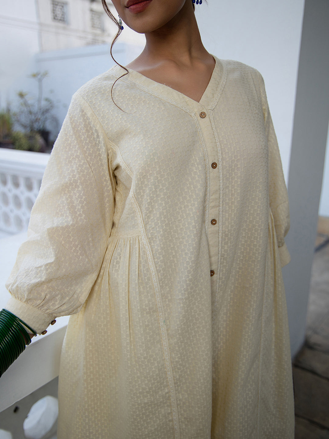 Janasya A-Line Dobby Cotton Cream Self Design V-Neck Tunic & Bottom