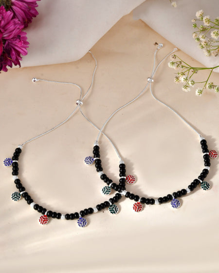Jewels Nest Traditional Silver-Plated Black Beaded Anklet with Floral Charms