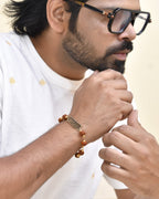 Jewels Nest Spiritual Rudraksha & Gold-Polished Bracelet