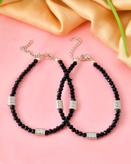 Jewels Nest Set of 2 Silver-Plated Anklets with Polished Black Beads and Barrel Charms