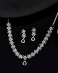 Jewels Nest American Diamond Floral Necklace Set with Sapphire Blue Stone Drop