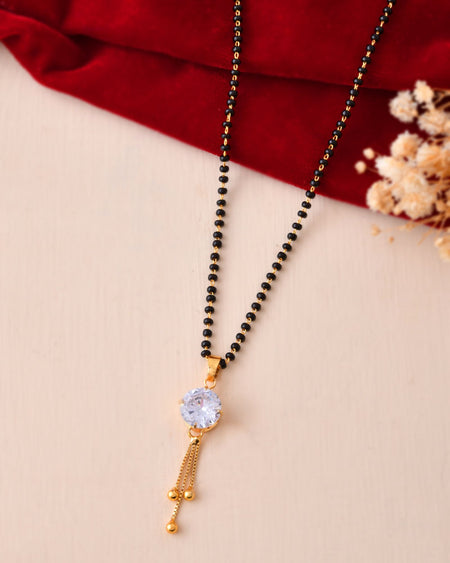 Jewels Nest Classic Gold-Tone White Stone Mangalsutra With Single Drop Tassel Pendant