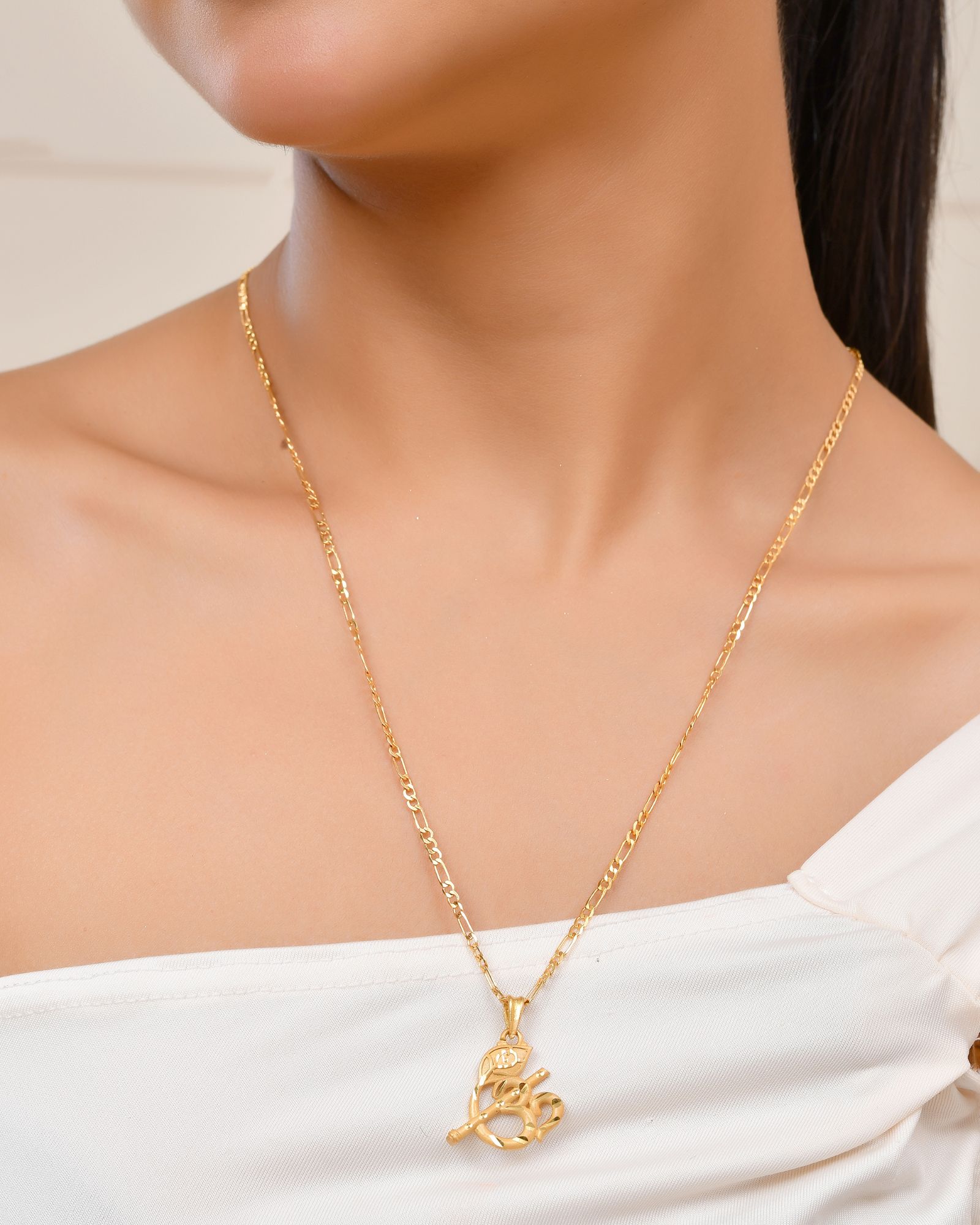 Jewels Nest Gold-Tone Flute Om Pendant Necklace For Women