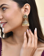 Jewels Nest Antique Gold-Polished Jhumka Earrings with Floral Detailing and Stone Embellishments - Distacart