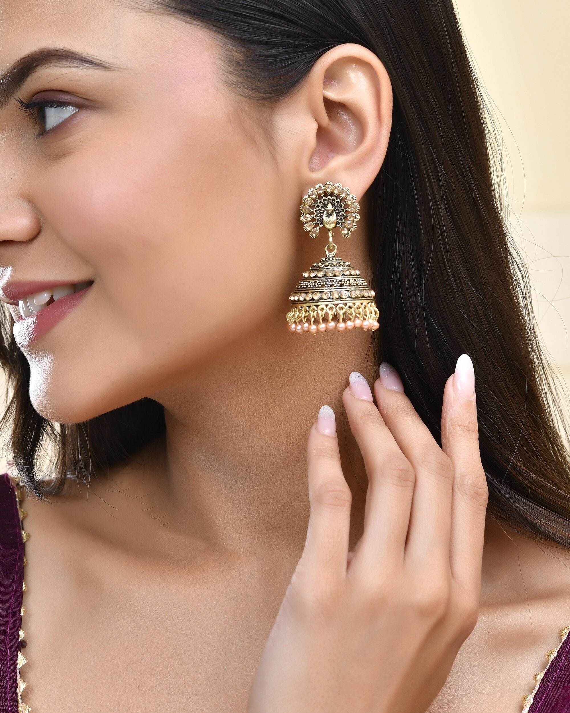 Jewels Nest Antique Gold-Polished Jhumka Earrings with Floral Detailing and Stone Embellishments - Distacart