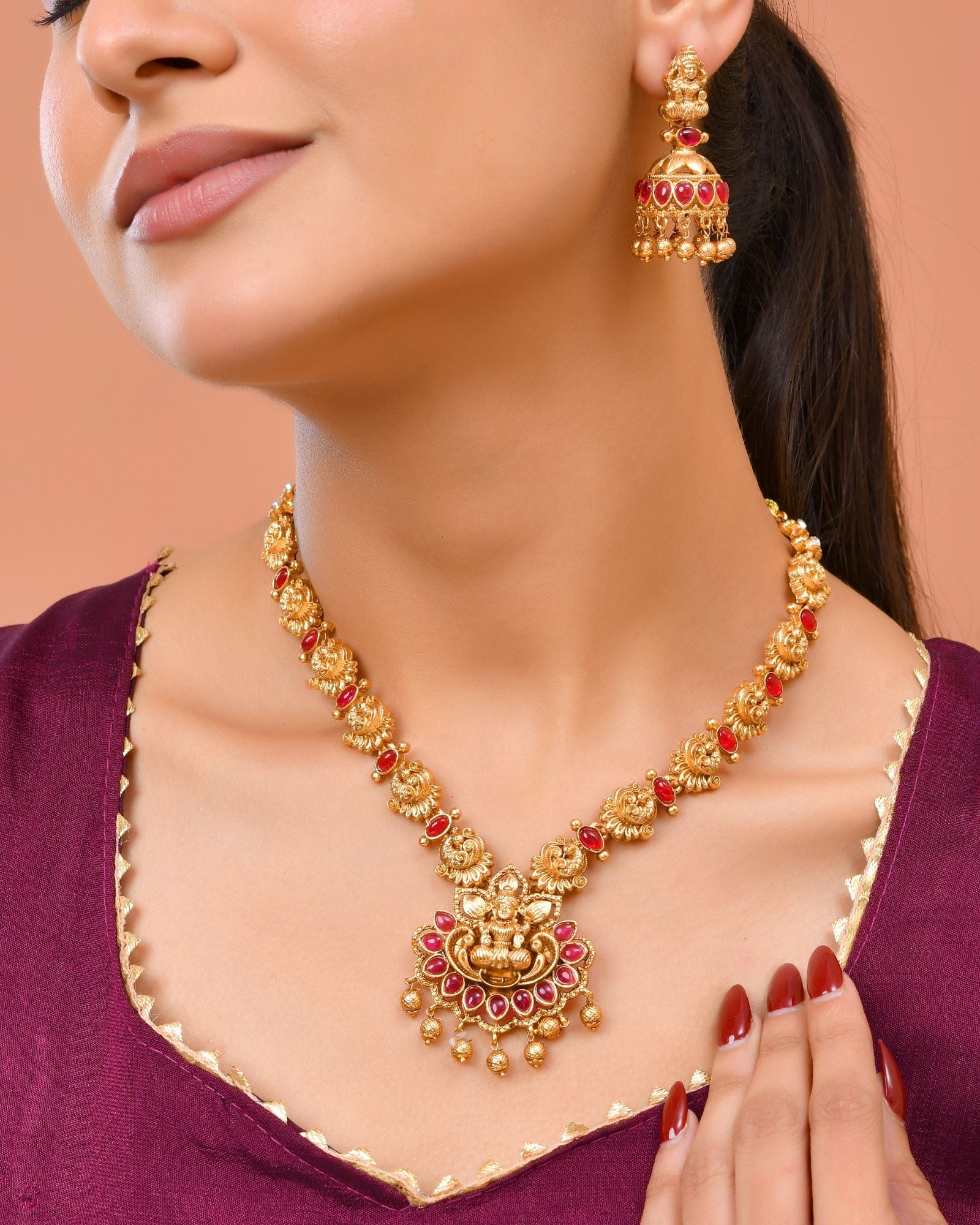 Jewels Nest Gold-Tone Temple Lakshmi Pendant Necklace With Jhumka Earrings