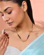 Jewels Nest Gold-Plated Black Beads Mangalsutra With Geometric Filigree Accent