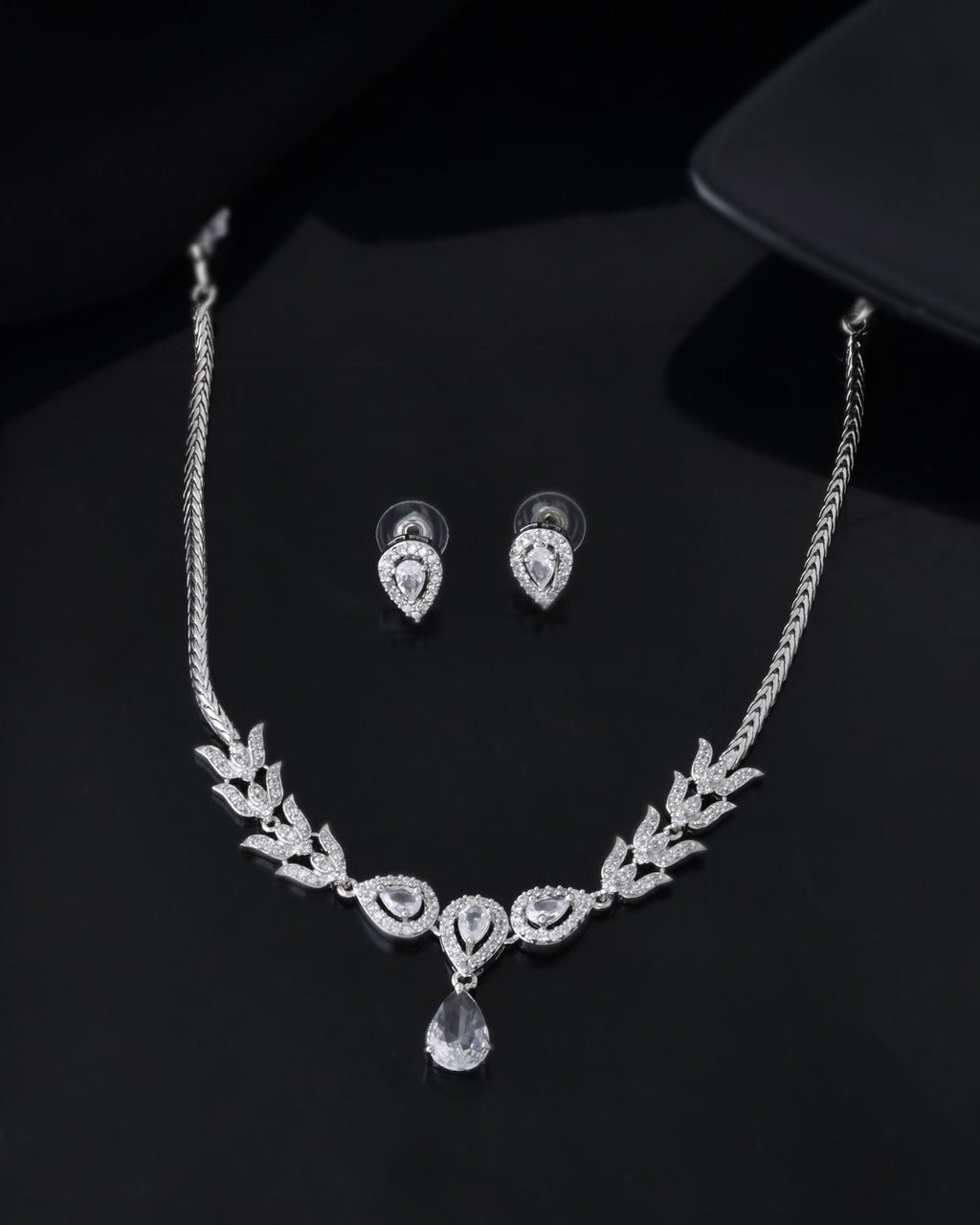 Jewels Nest Silver-Plated American Diamond (Ad) Necklace Set With Teardrop Pendant & Matching Earrings