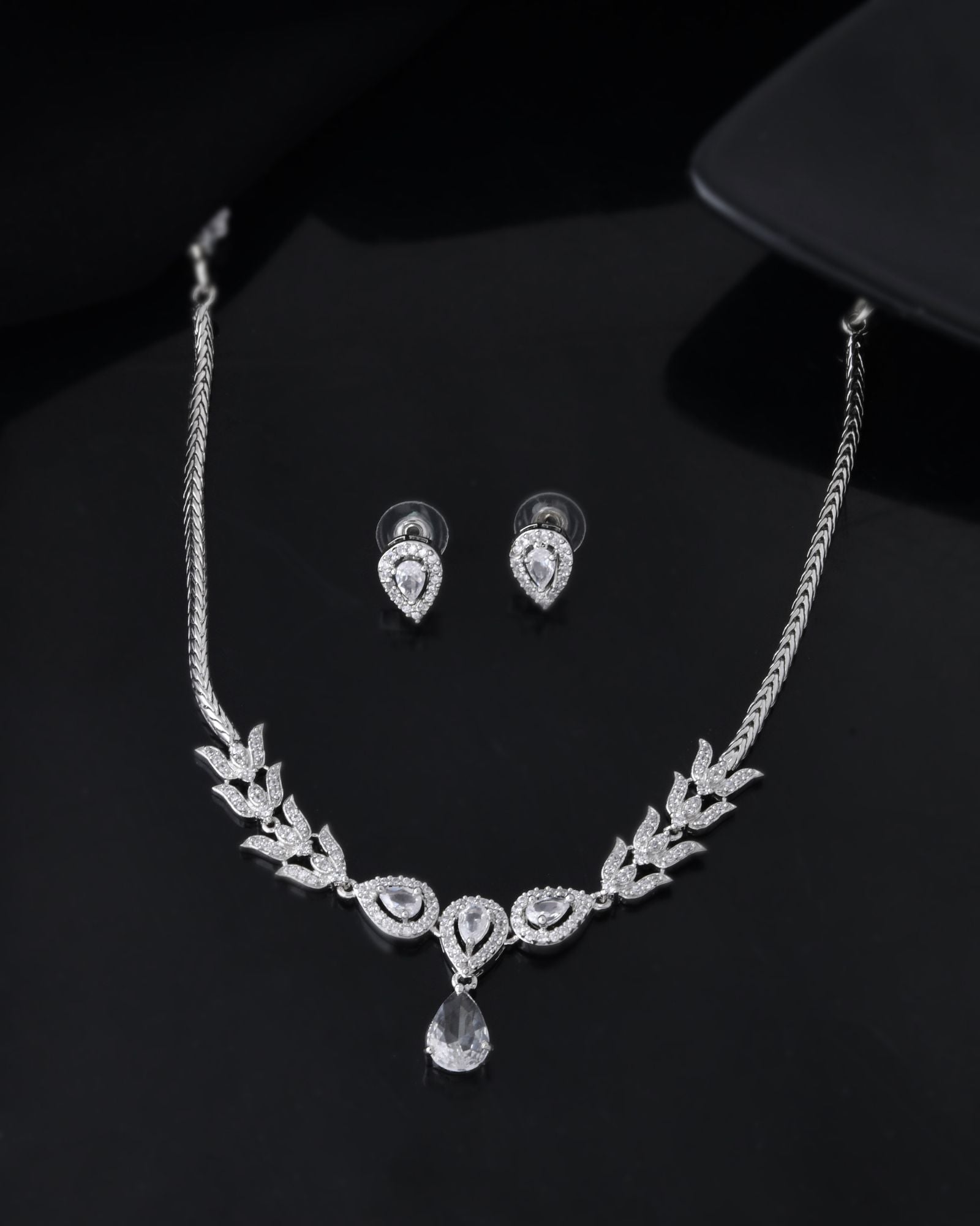 Jewels Nest Silver-Plated American Diamond (Ad) Necklace Set With Teardrop Pendant & Matching Earrings
