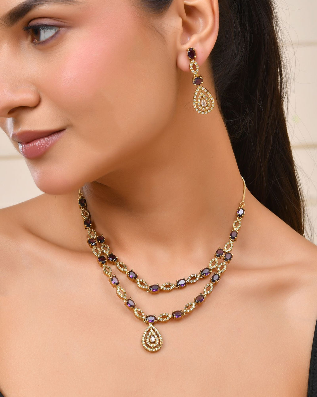 Jewels Nest Gold-Plated American Diamond (Ad) Purple Stone Teardrop Necklace Set With Matching Earrings
