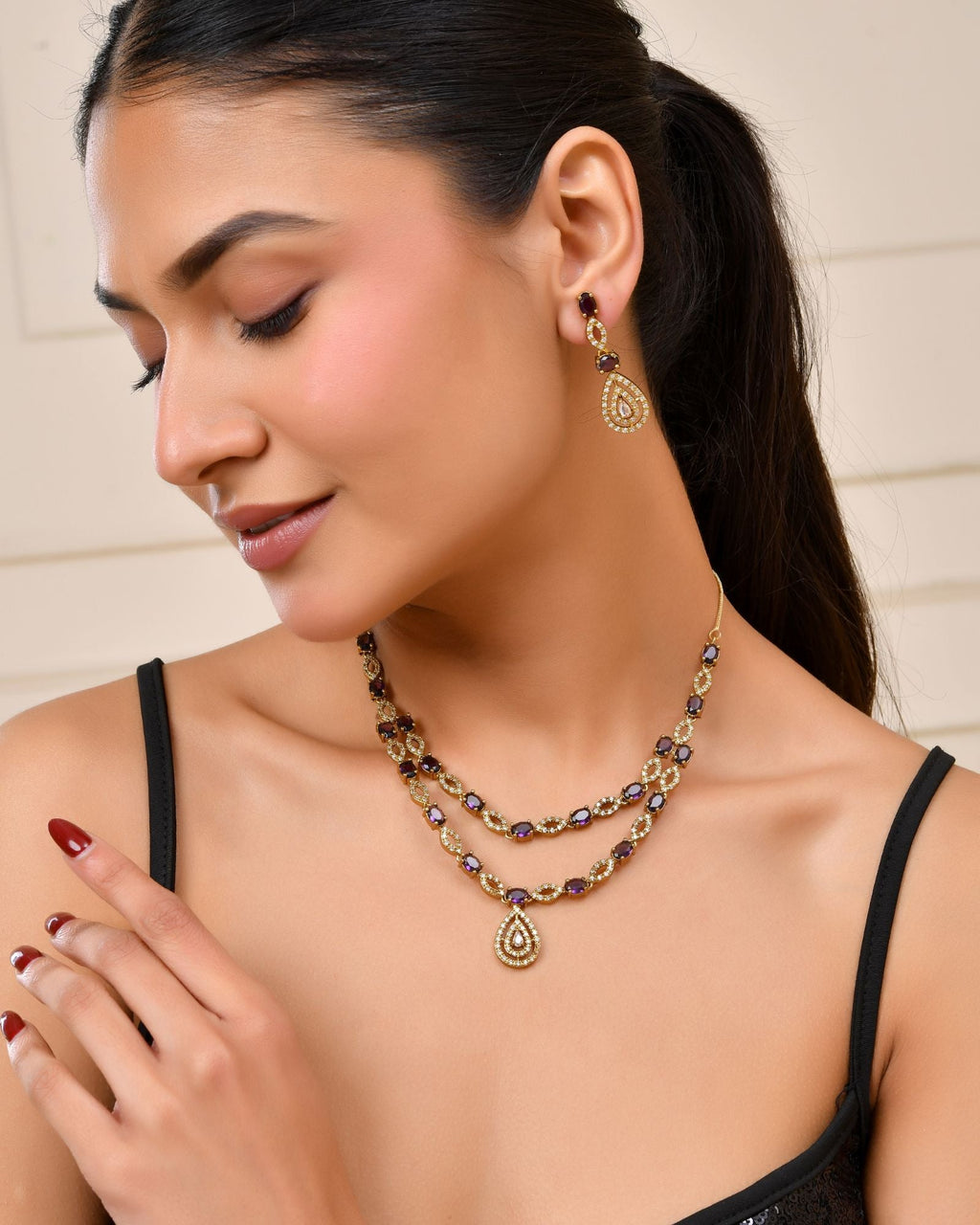Jewels Nest Gold-Plated American Diamond (Ad) Purple Stone Teardrop Necklace Set With Matching Earrings
