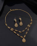 Jewels Nest Gold-Plated American Diamond (Ad) Purple Stone Teardrop Necklace Set With Matching Earrings
