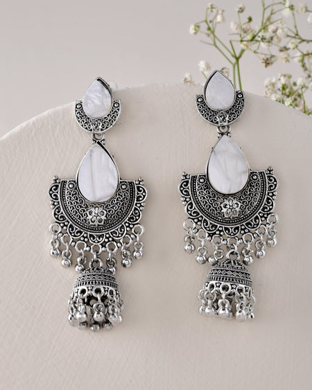 Jewels Nest Oxidized Silver Half Moon Jhumka Earrings with Intricate Design