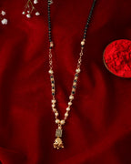 Jewels Nest Graceful Gold-Polished Black Bead Mangal Sutra with Intricate Pendant - Distacart