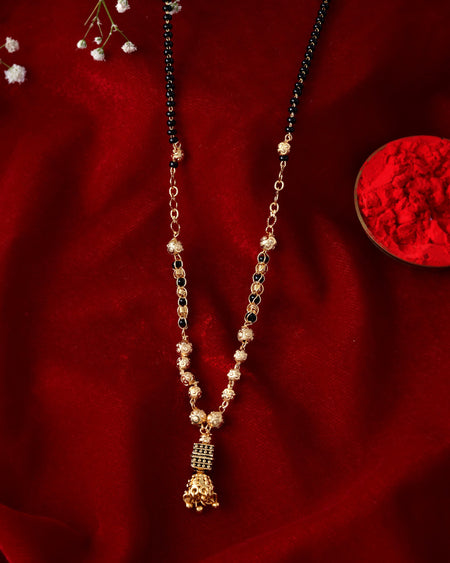 Jewels Nest Graceful Gold-Polished Black Bead Mangal Sutra with Intricate Pendant