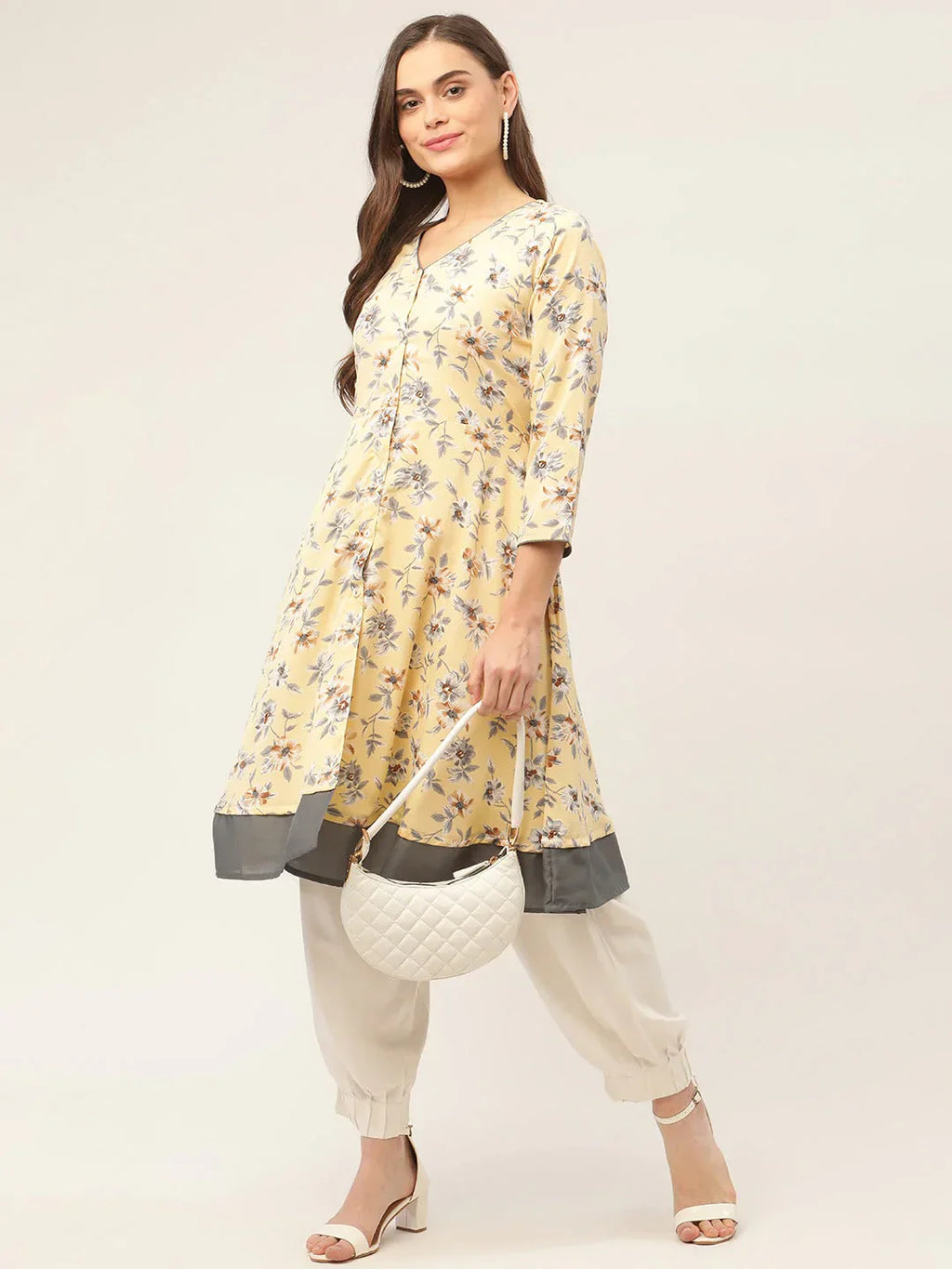 Jompers Women's Yellow and White Flared Printed kurta - Distacart