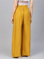 Jompers Women Mustard Solid Straight Palazzos - Distacart