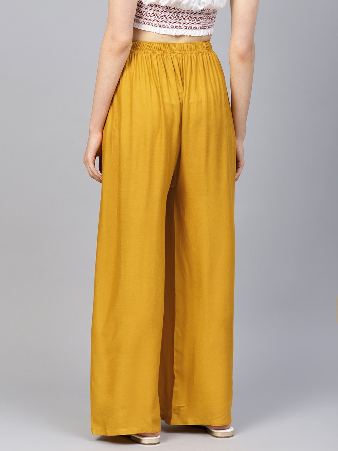Jompers Women Mustard Solid Straight Palazzos - Distacart