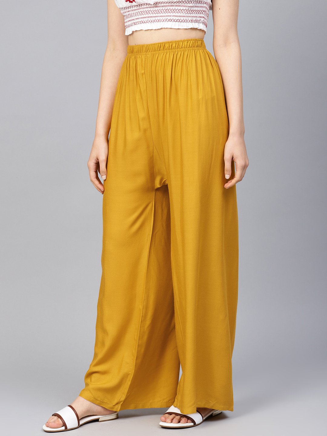 Jompers Women Mustard Solid Straight Palazzos - Distacart