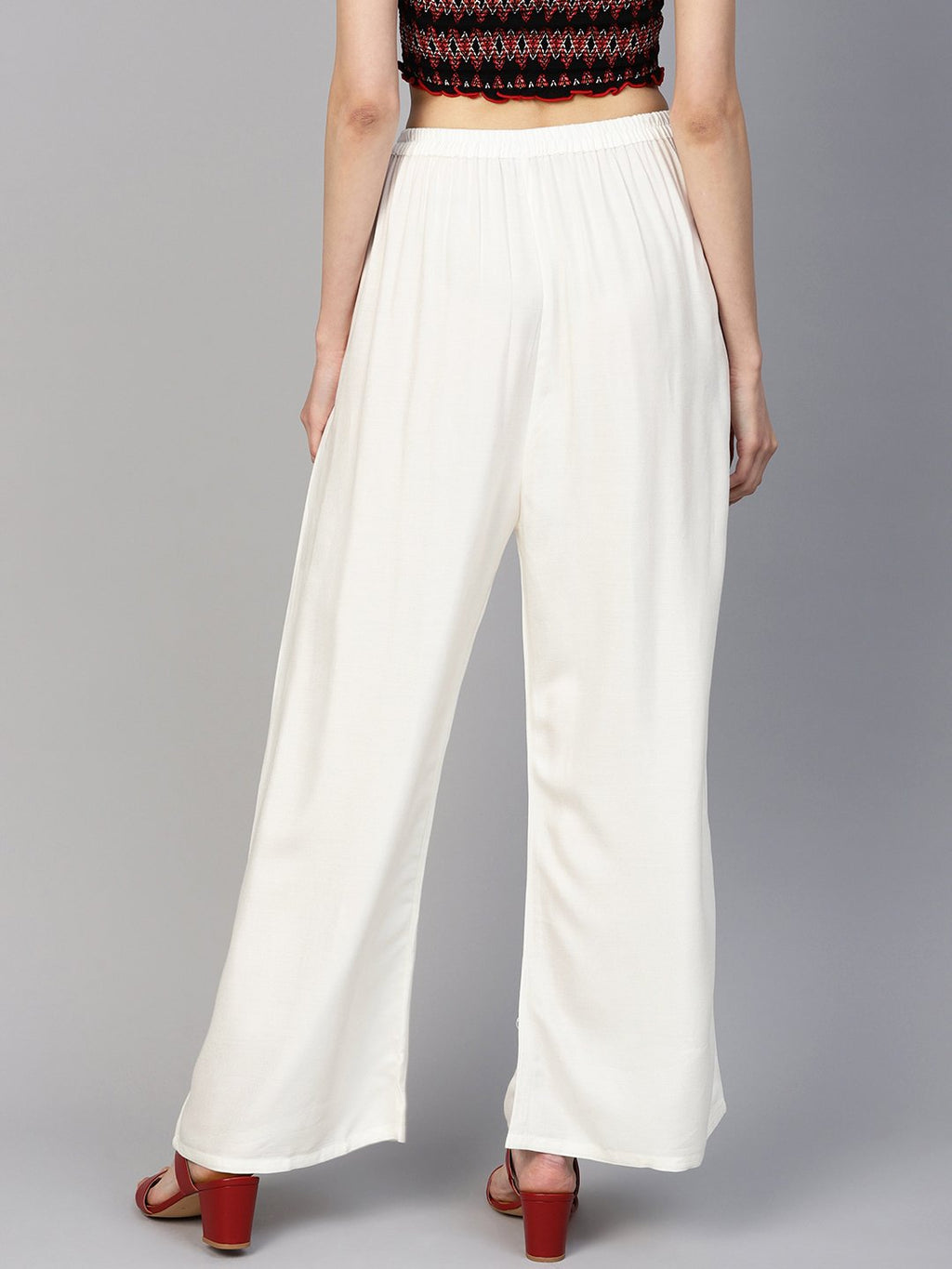 Jompers Women Off-White Solid Straight Palazzos - Distacart