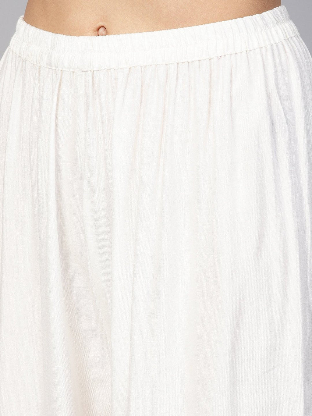 Jompers Women Off-White Solid Straight Palazzos - Distacart