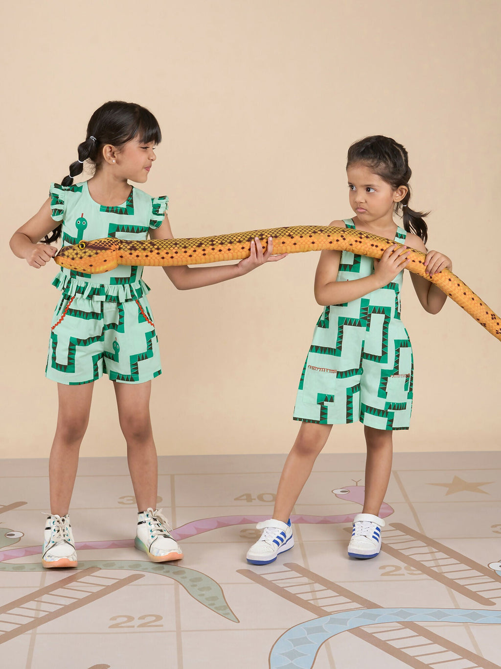 Snakes and Ladders Girls Green Table Print Jumpsuit from Siblings Collection