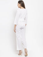 Jompers Women White Solid Jumpsuit with sequence on neck - Distacart