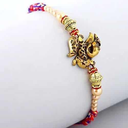 Ganesha Rakhi & Cadbury Silk In Best Bro Sleeve Online