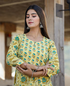 Kaajh Women's Yellow Floral Print Side Slit Cotton Kurta Pant Set - Distacart