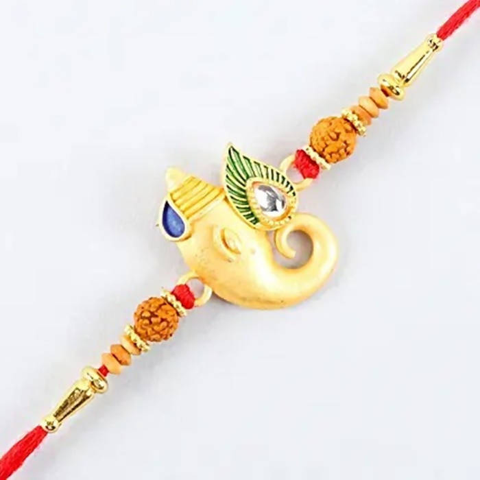 Spiritual Lord Ganesha Rakhi & Kaju Roll Box