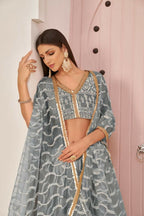 Aastha Fashion Gray Butterfly Net White Cotton Thread Work, Zari Work And Sandwich Sequence Work Embroidery Wedding Wear Lehenga Choli