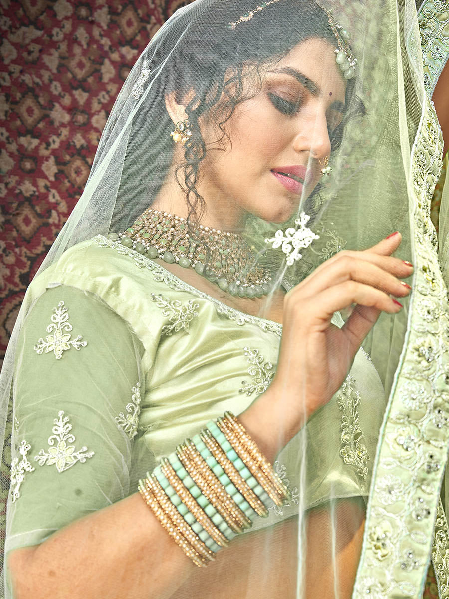 Myra Pista Heavy Embroidered Net Lehenga