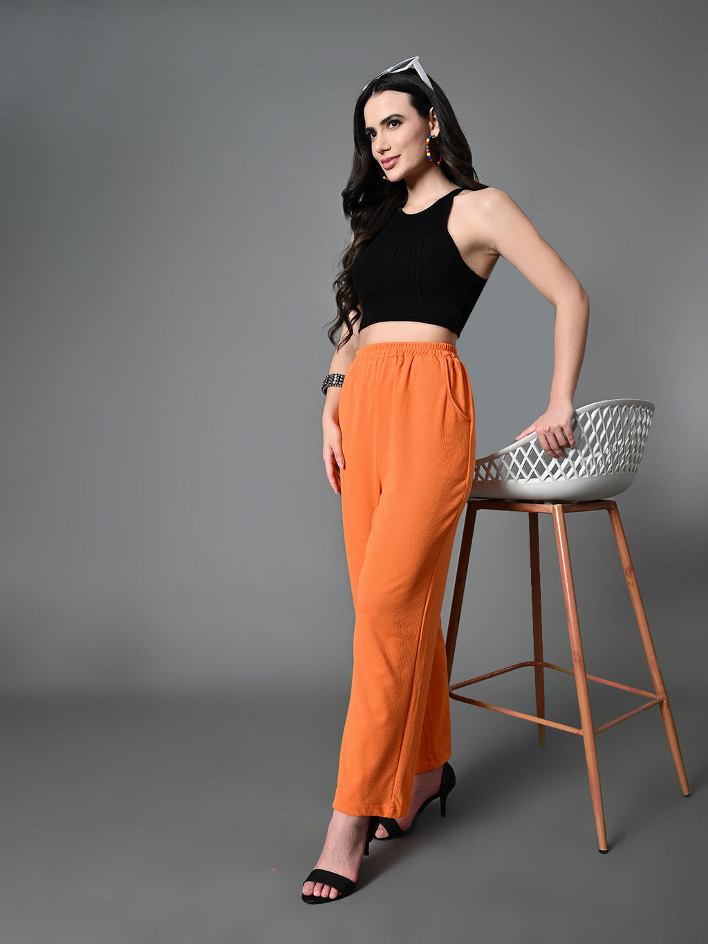 Myshka Women's Solid Ribbed High-Rise Wide Leg Casual Trousers in Orange Color