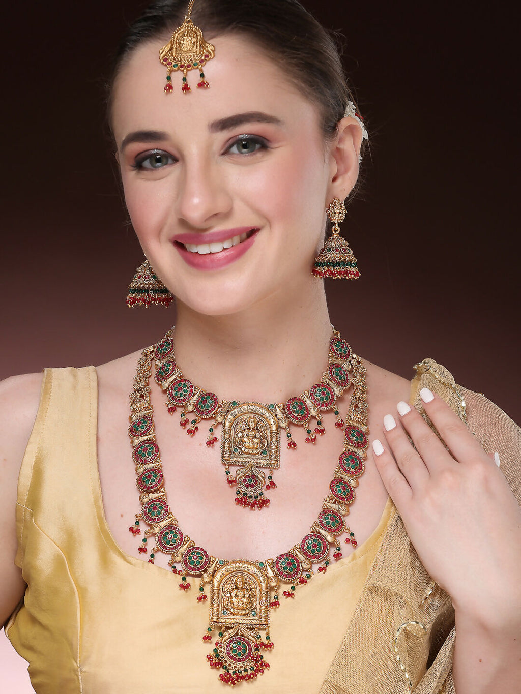 NVR Women's Set of 2 Gold-Polished Green & Red Stone Studded Lakshmi Design Temple Jewellery Set with Maangtikka