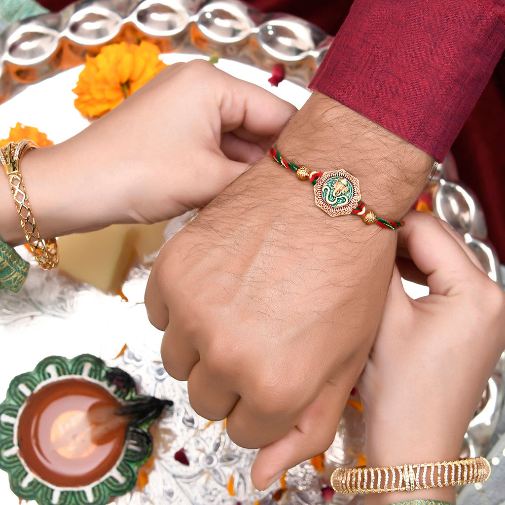 trueBrowns X Voylla Traditional Om And Lord Ganesha Motif Thread Rakhi - Distacart
