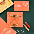 trueBrowns X Voylla Traditional King And Queen Pearl Beads Bhaiya-Bhabhi Rakhi - Distacart