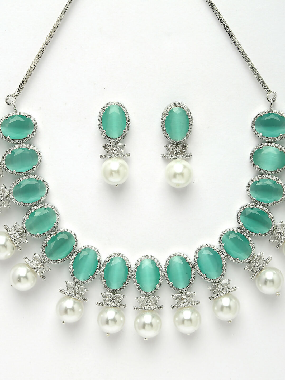 NVR Women's Silver-Plated Green American Diamond Studded Handcrafted Jewellery Set