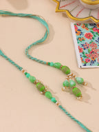 NVR Set of 2 Green Artificial Beads Bhaiya Bhabhi Rakhi with Roli Chawal Chandan & Mishri - Distacart