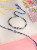 NVR Set of 2 Blue Evil Eye Artificial Beads Bhaiya Bhabhi Rakhi with Roli Chawal Chandan & Mishri - Distacart