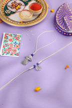 NVR Set of 2 Silver Toned Pearls & Beads Bhaiya Bhabhi Rakhi with Roli Chawal Chandan & Mishri - Distacart