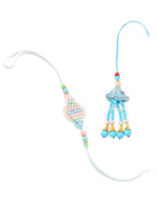 NVR Set of 2 Blue & Pink Artificial Stones & Beads Bhaiya Bhabhi Rakhi with Roli Chawal Chandan & Mishri - Distacart