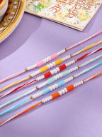 NVR Men Set of 6 Multicolor Pearls Thread Rakhi with Roli Chawal Chandan & Mishri - Distacart
