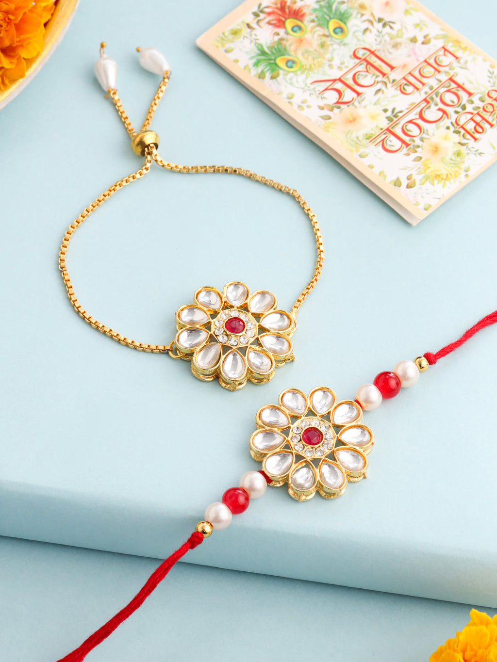 NVR Set of 2 Gold Toned Kundan Studded Floral Design Bhaiya Bhabhi Rakhi Set with Roli Chawal Chandan & Mishri - Distacart