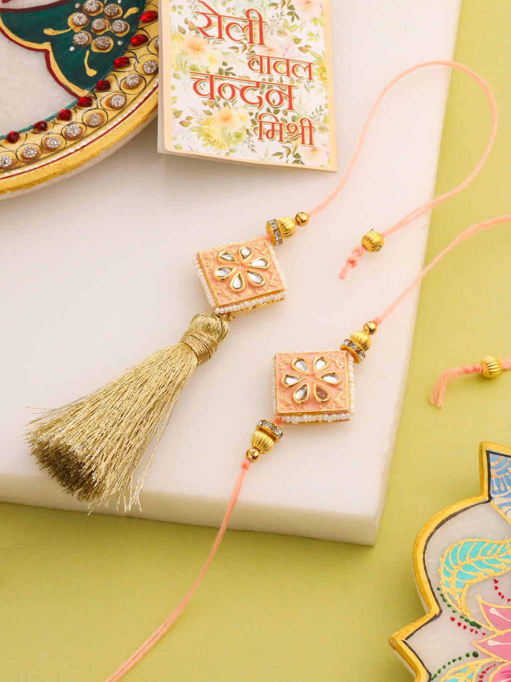 NVR Set of 2 Handmade Peach Kundan Studded Bhaiya Bhabhi Rakhi Set with Roli Chawal Chandan & Mishri - Distacart