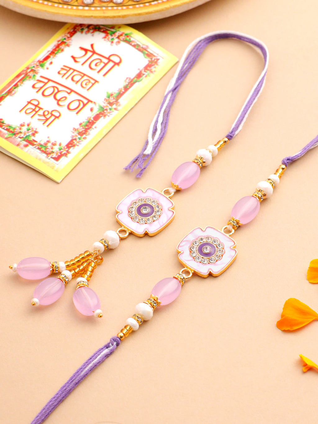 NVR Set of 2 Purple Artificial Stones & Beads Floral Design Thread Bhaiya Bhabhi Rakhi with Roli Chawal Chandan & Mishri - Distacart